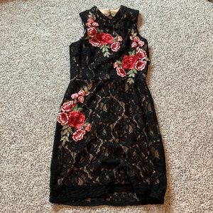 Black Lacey form fitting size medium Lily rose dress